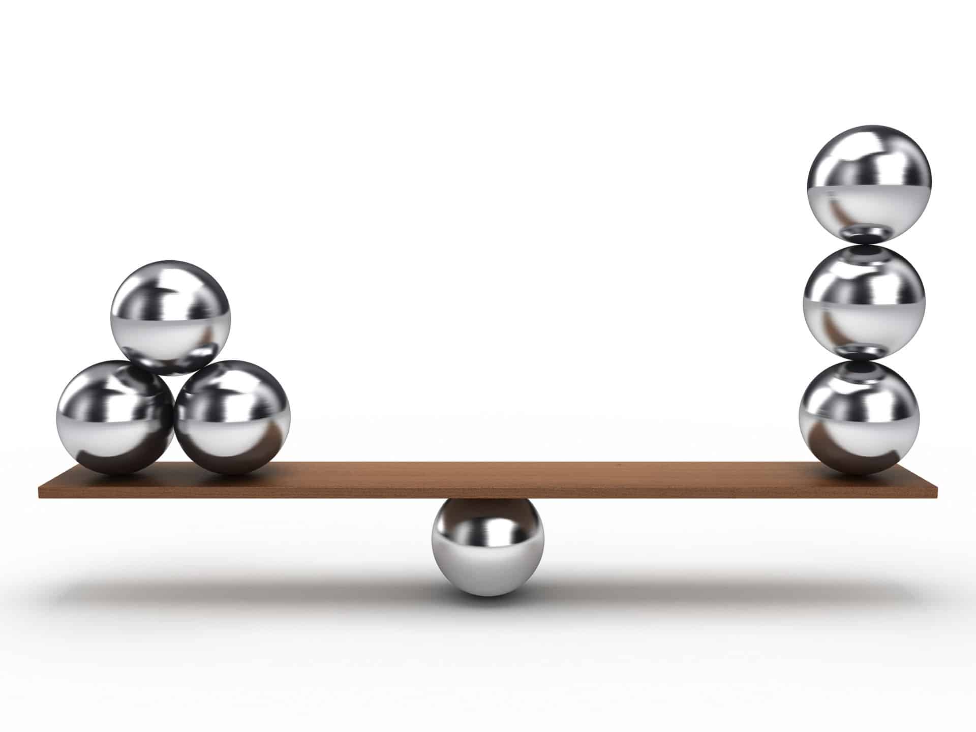 Marbles on a scale representing the necessary balance between content seo vs technical seo. 